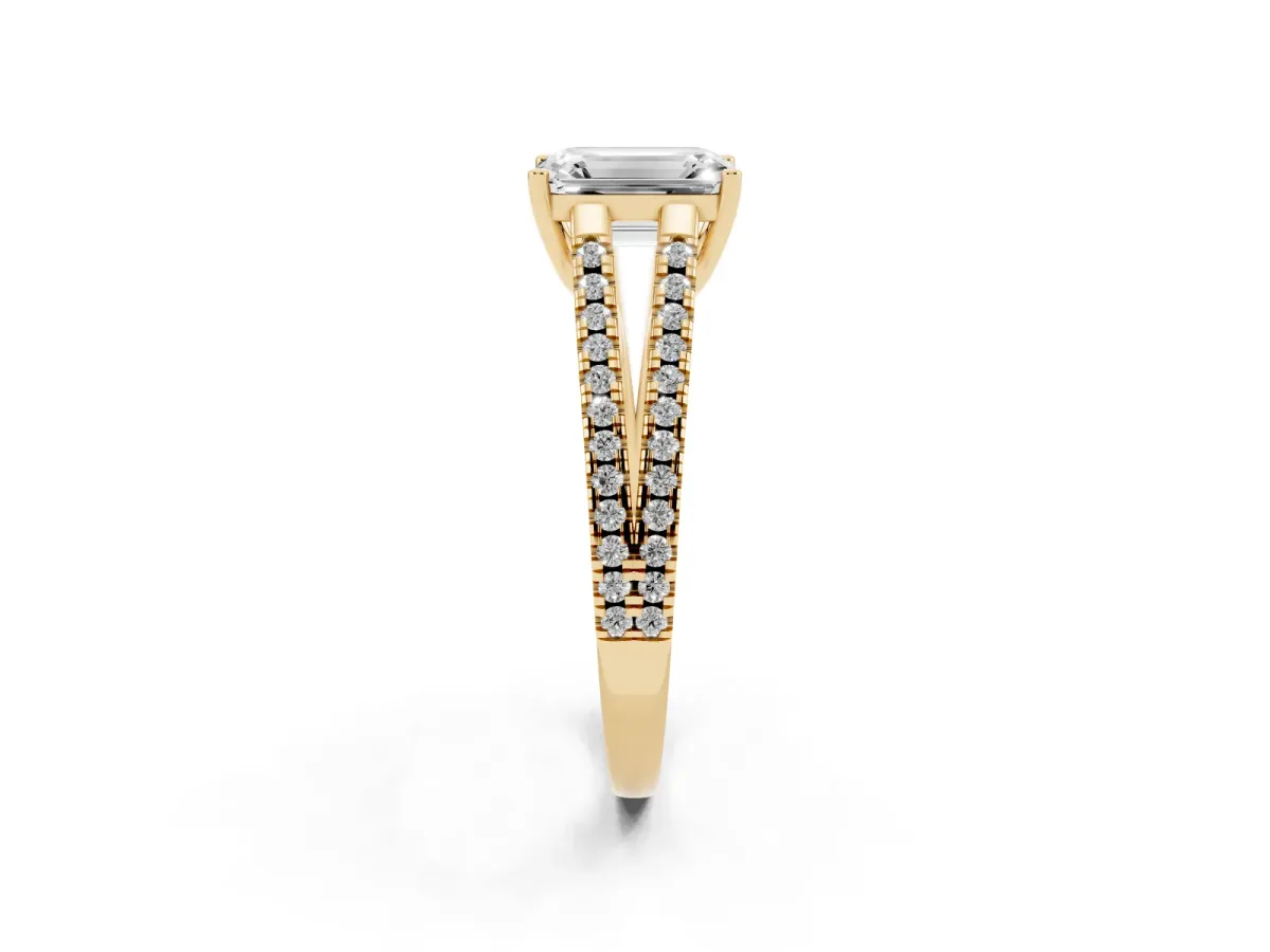 Emerald Cut Diamond Solitaire Engagement Ring with Split Shank Pavé Band Yellow gold