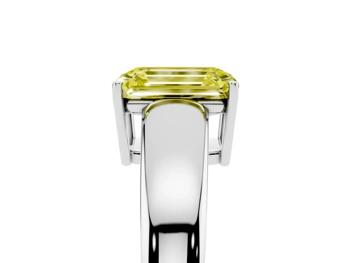Fancy Yellow Emerald Cut Solitaire Diamond Ring with Tapered Band and Four-Prong Setting Silver