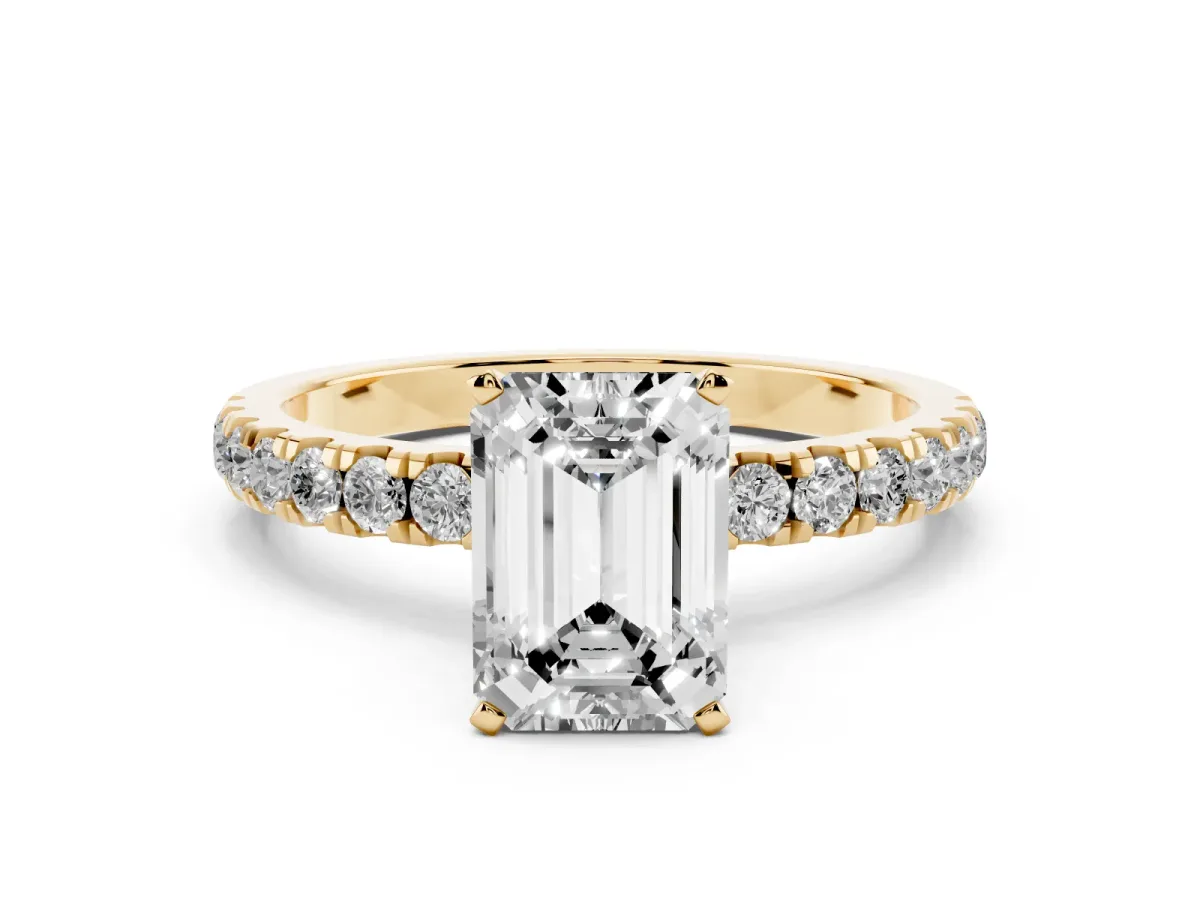 Emerald Cut Diamond Solitaire Ring with Pavé Accents and Four-Prong Setting Yellow gold
