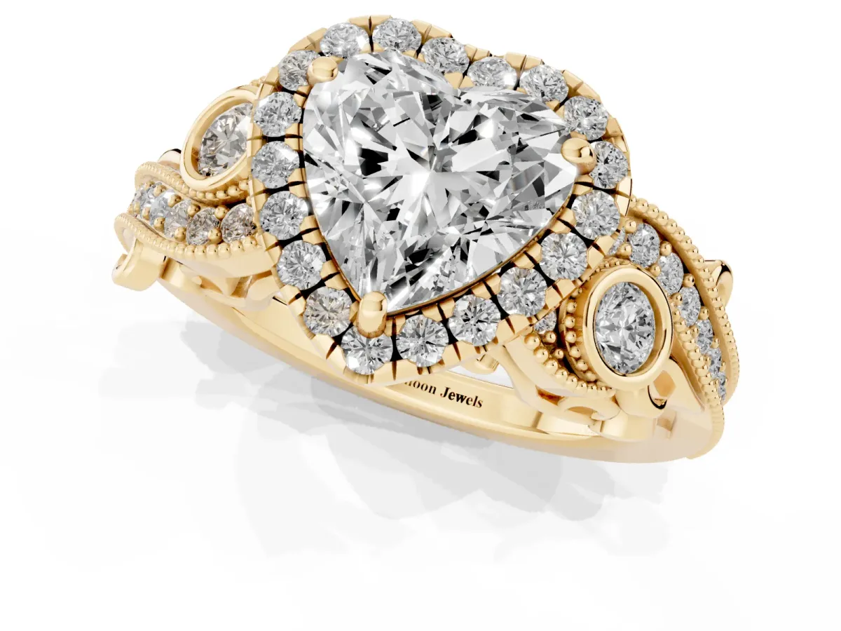 Heart Cut Halo Diamond Ring with Milgrain and Bezel Accents on a Split Shank Band Yellow gold