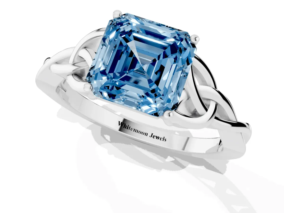 Fancy Blue Asscher Cut Diamond Solitaire Engagement Ring with Celtic Knot Band and Four-Prong Setting Silver