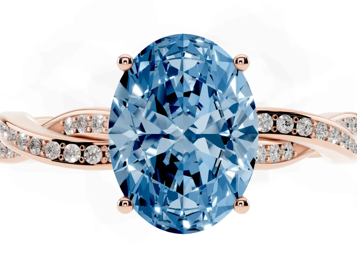 Fancy Blue Oval Cut Solitaire Twisted Pave Diamond Ring with Four-Prong Setting Rose gold