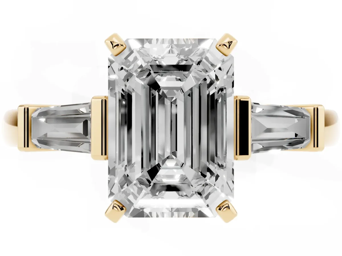 Emerald Cut Cut Diamond Solitaire Ring with Tapered Baguette Accents and Four-Prong Setting Yellow gold