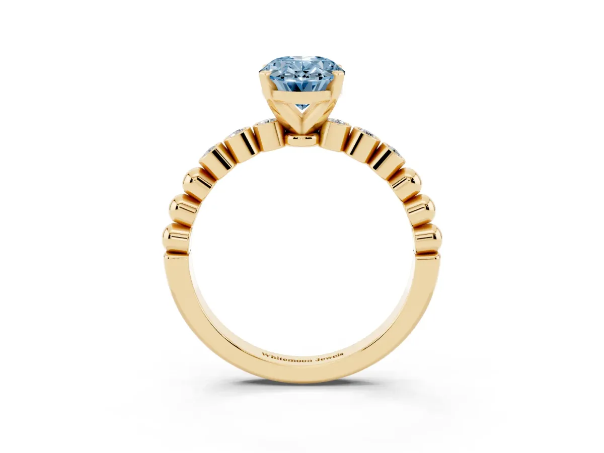 Fancy Blue Oval Cut Solitaire Bezel Accent Diamond Engagement Ring with Beaded Band and Four-Prong Setting Yellow gold