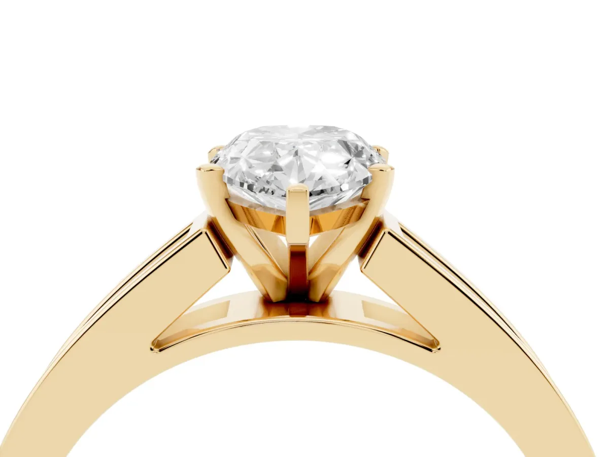 Pear Cut Solitaire Diamond Ring with Channel-Set Band and Four-Prong Setting Yellow gold