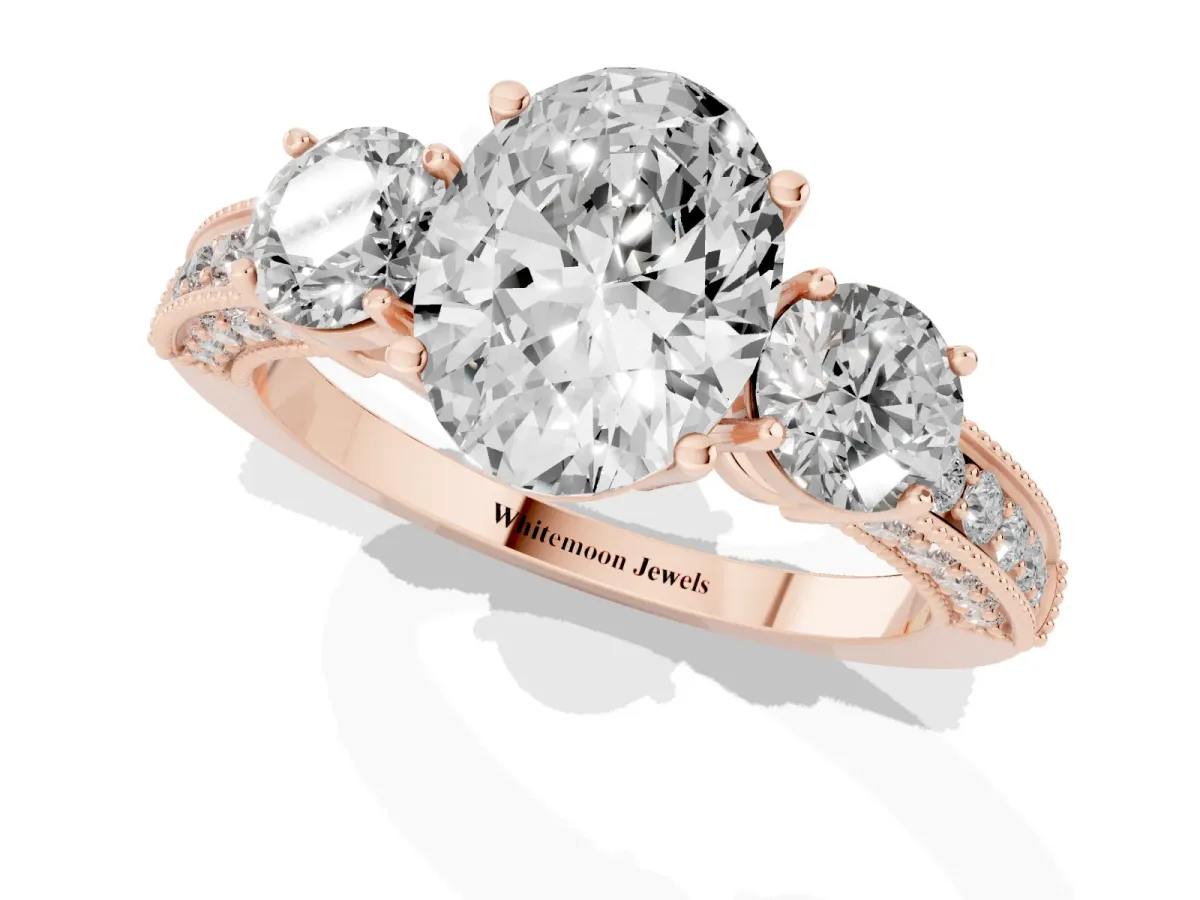 Oval Cut Three-Stone Diamond Ring with Pavé Band and Four-Prong Setting Rose gold