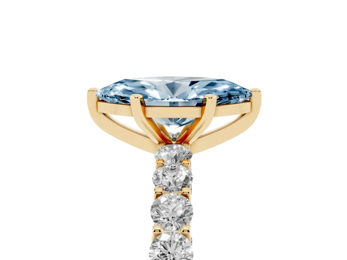 Fancy Blue Marquise Cut Diamond Solitaire Ring with Shared Prong Pavé Band and Four-Prong Setting Yellow gold