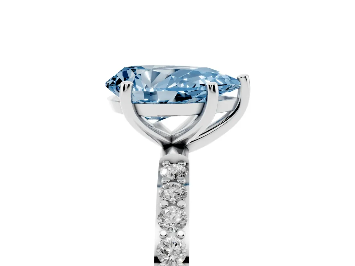 Fancy Blue Pear Cut Diamond Solitaire Ring with Round Pavé Shoulders and Prong Setting Silver