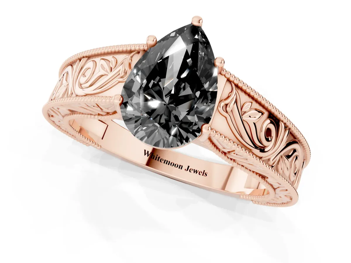 Fancy Black Pear Cut Diamond Solitaire Ring with Engraved Band and Four-Prong Setting Rose gold