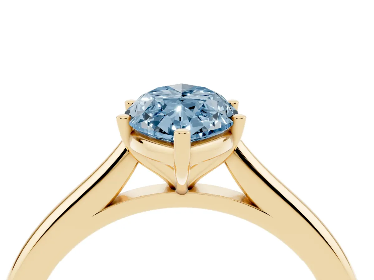 Fancy Blue Marquise Cut Cut Solitaire Ring with Cathedral Band and Four-Prong Setting Yellow gold