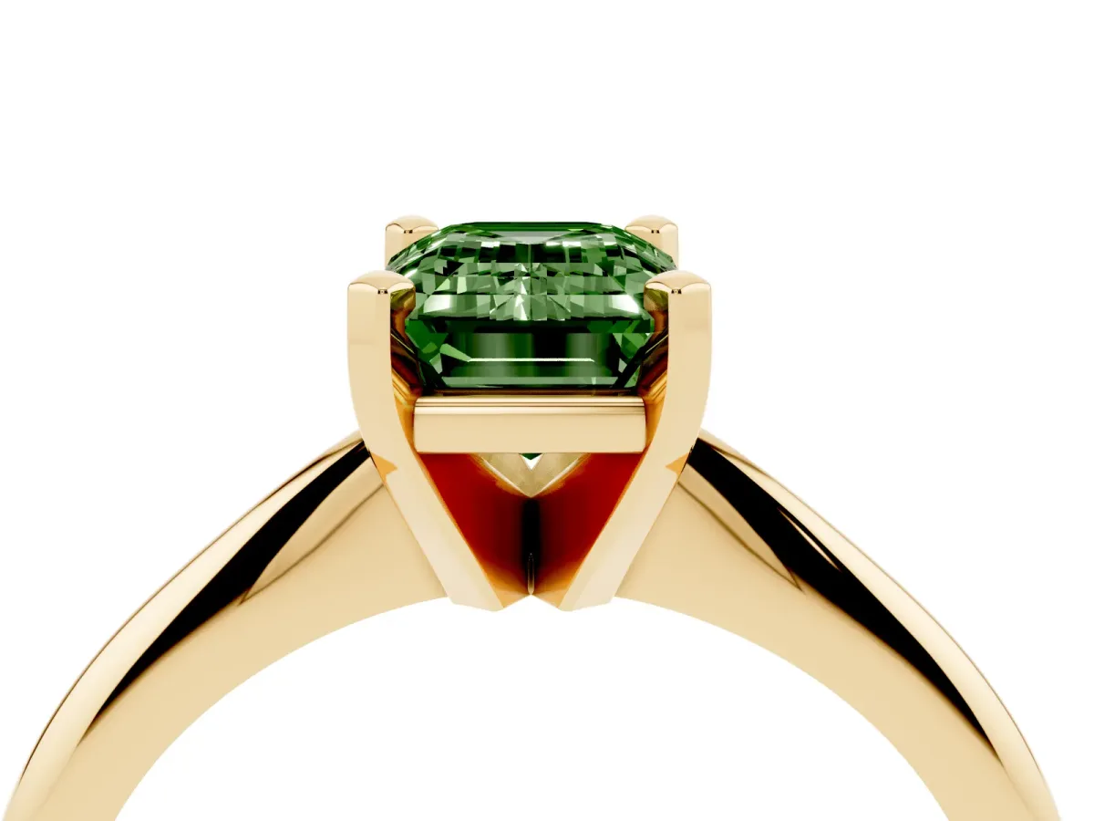 Fancy Green Emerald Cut Cut Solitaire Ring with Four-Prong Setting on a Classic Band Yellow gold