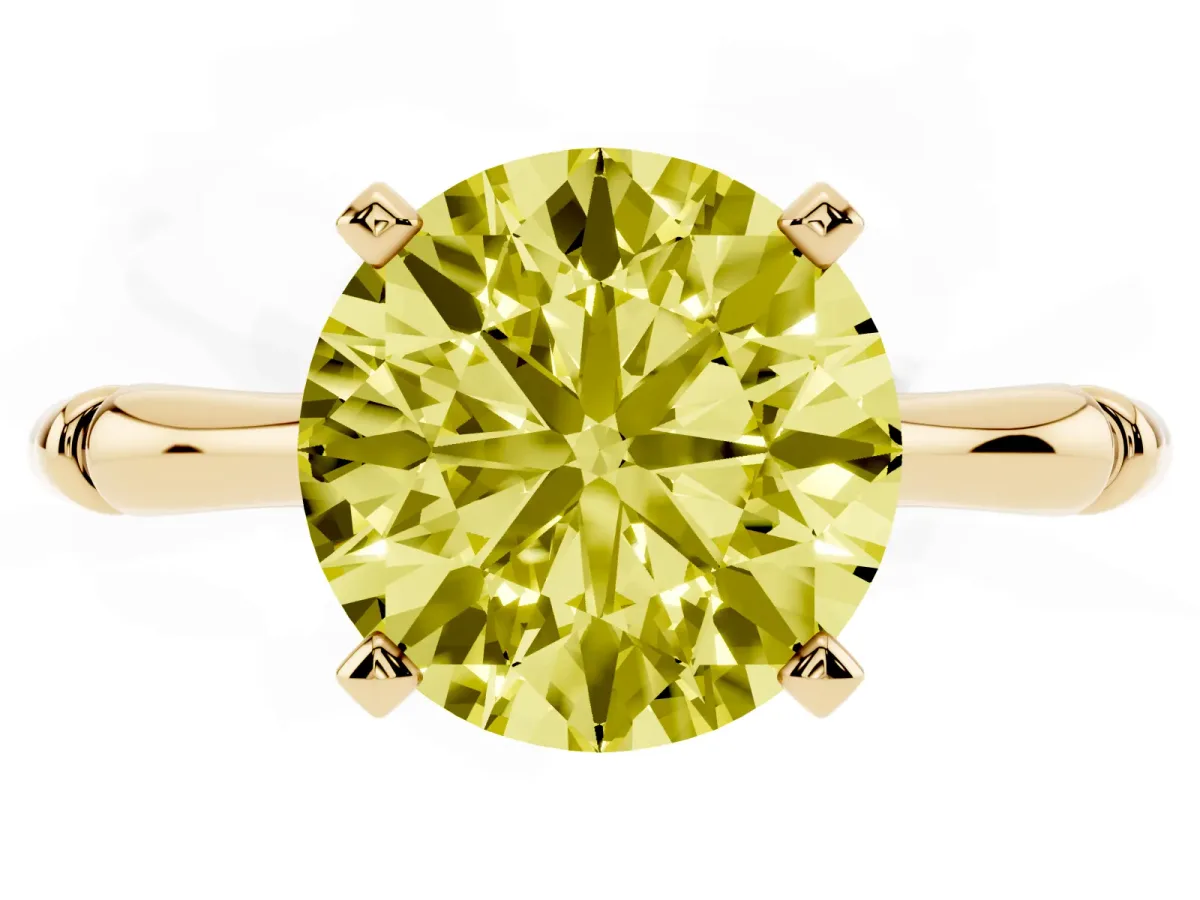 Fancy Yellow Round Cut Solitaire Diamond Ring with Bamboo Band and Four-Prong Setting Yellow gold