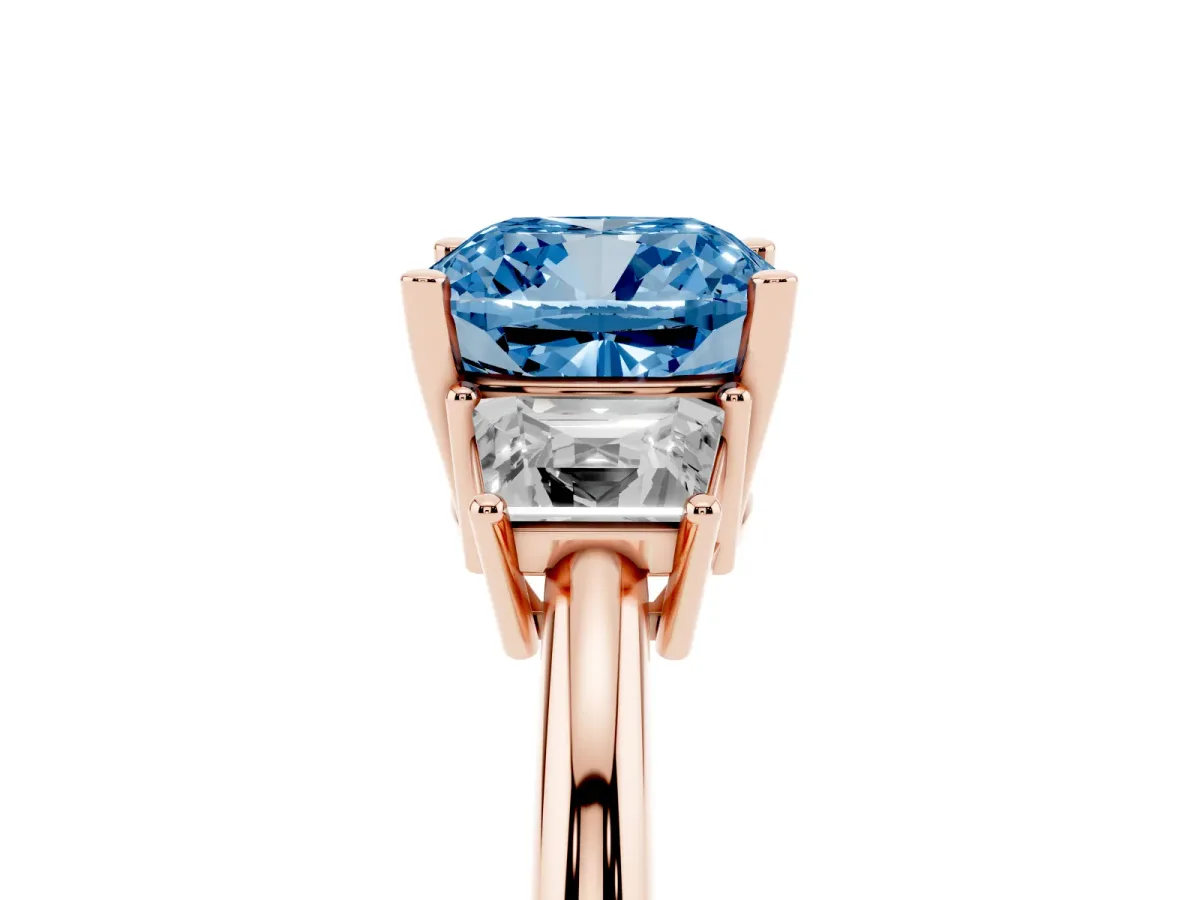 Fancy Blue Cushion Cut Diamond Three-Stone Ring with Trapezoid Side Stones and Prong Setting Rose gold