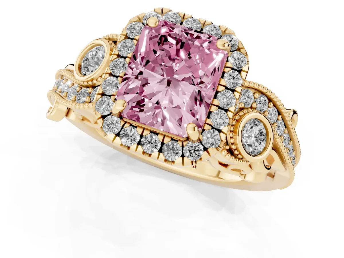 Fancy Pink Radiant Cut Halo Diamond Ring with Milgrain and Bezel Accents on a Split Shank Band Yellow gold