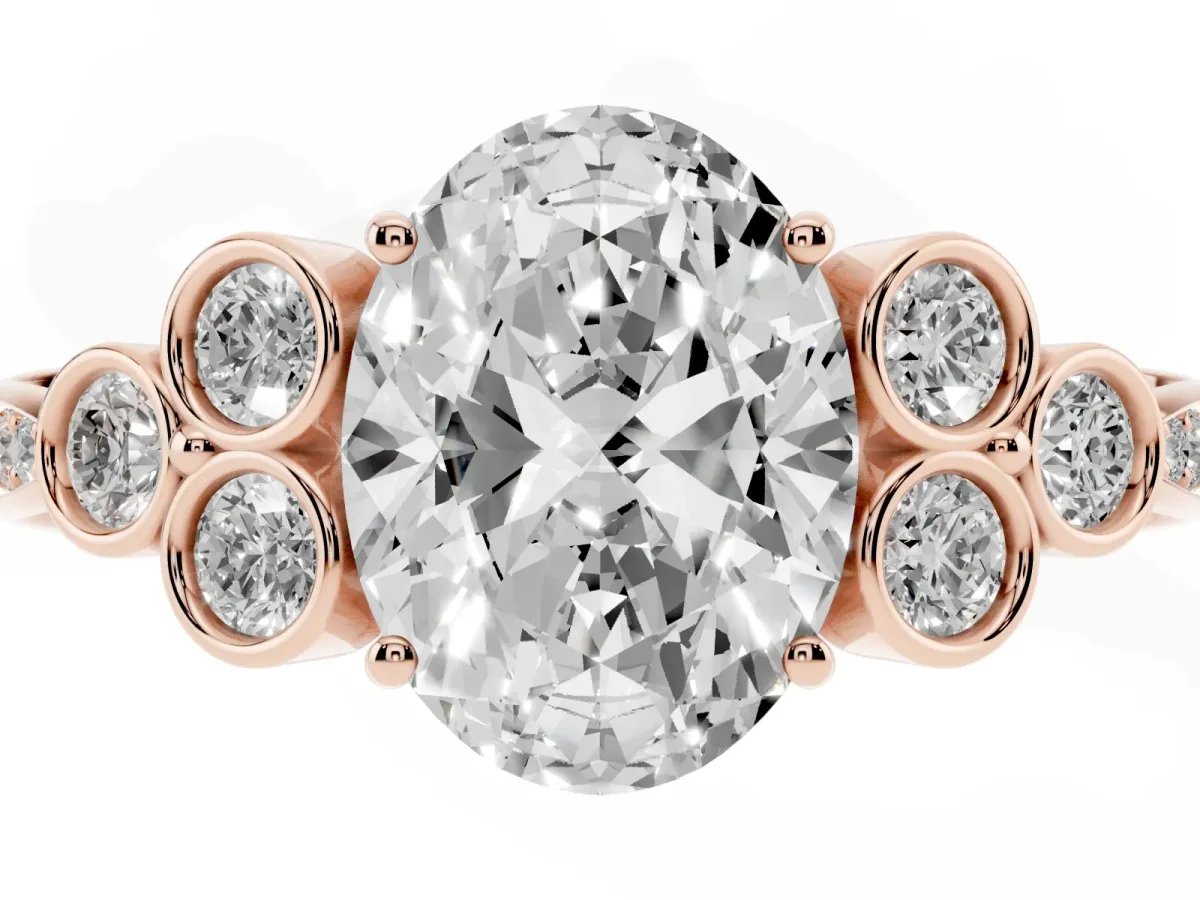 Oval Cut Cut Diamond Engagement Ring with Bezel Set Round Side Stones and Prong Setting Rose gold