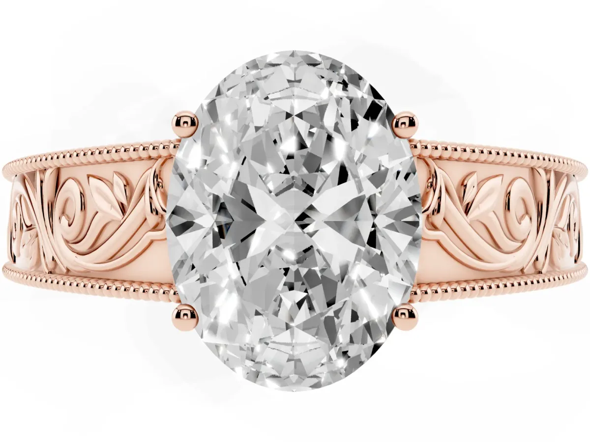 Oval Cut Diamond Solitaire Ring with Engraved Band and Four-Prong Setting Rose gold