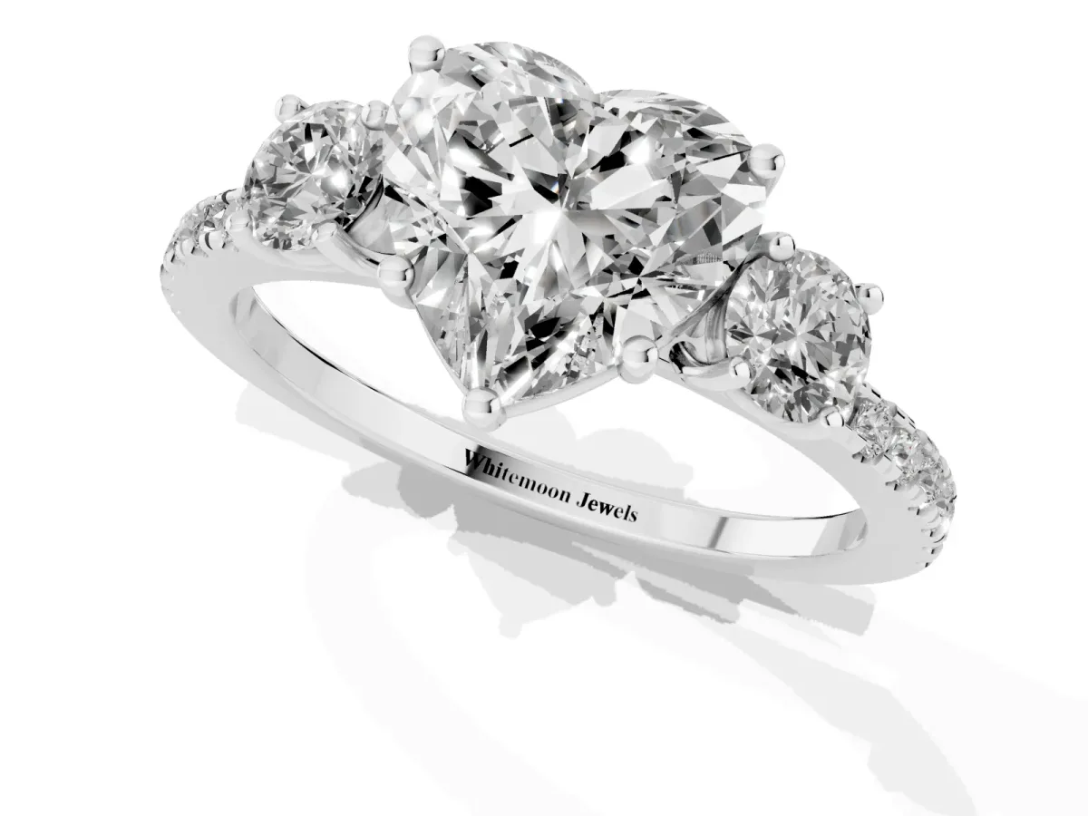 Three-Stone Heart Cut Cut Diamond Pavé Band with Prong Setting Platinum