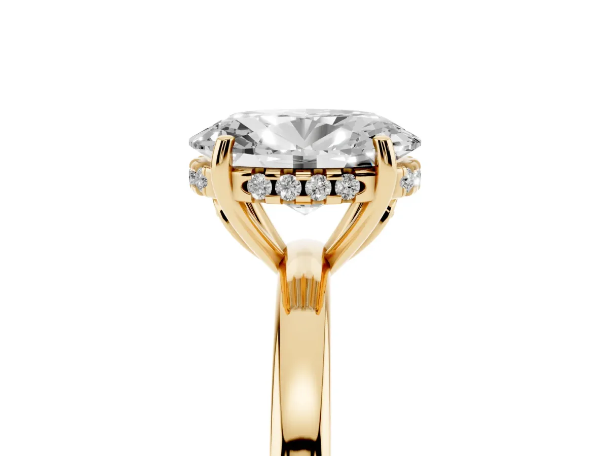 Oval Cut Solitaire Diamond Ring with Prong Setting and Plain Band Yellow gold
