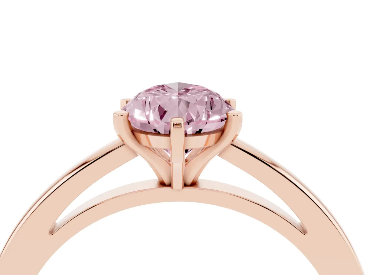 Fancy Pink Pear Cut Solitaire Diamond Engagement Ring with Four-Prong Setting on a Classic Band Rose gold