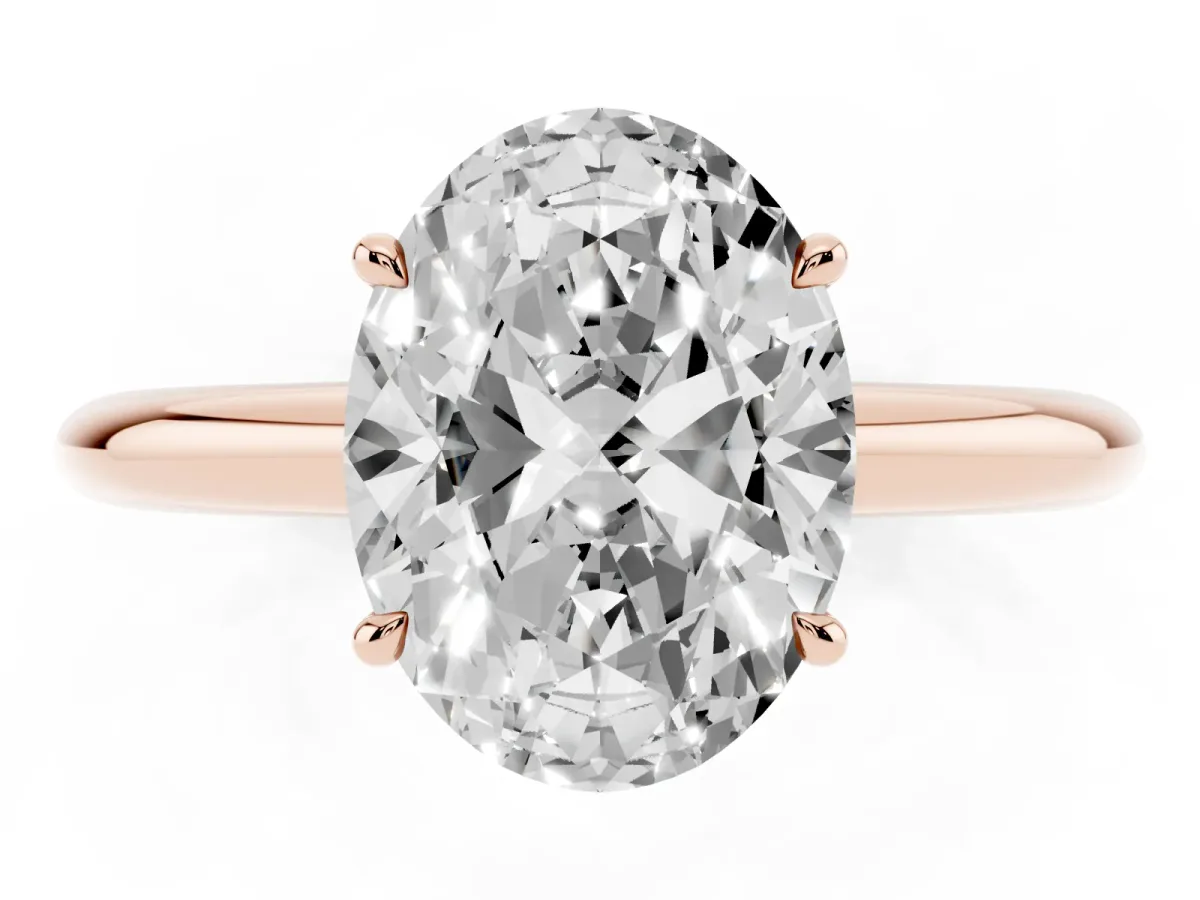 Oval Cut Brilliant Solitaire Engagement Ring with Six-Prong Setting and Classic Band Rose gold