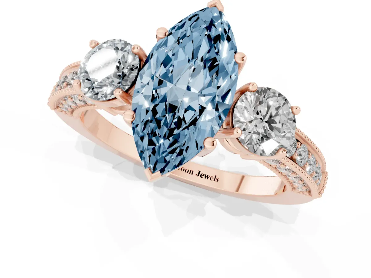 Fancy Blue Marquise Cut Three-Stone Diamond Ring with Pavé Band and Four-Prong Setting Rose gold