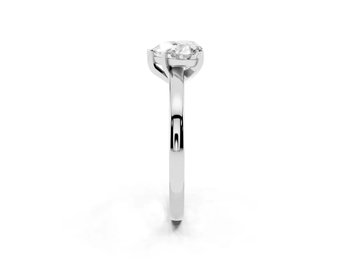 Heart Cut Solitaire Diamond Engagement Ring with Four-Prong Setting on a Classic Band Silver