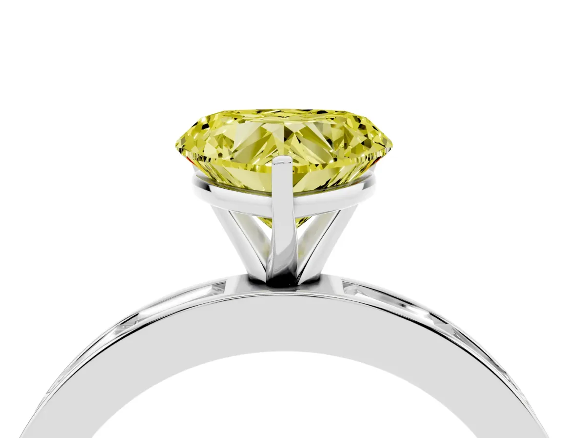 Fancy Yellow Heart Cut Solitaire Diamond Ring with Channel-Set Baguette Band and Four-Prong Setting Silver