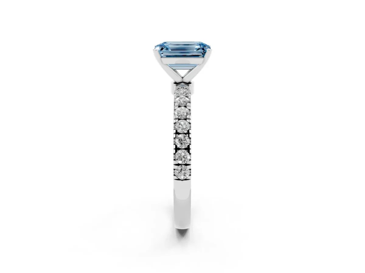 Fancy Blue Emerald Cut Diamond Solitaire Ring with Pavé Accents and Four-Prong Setting Platinum