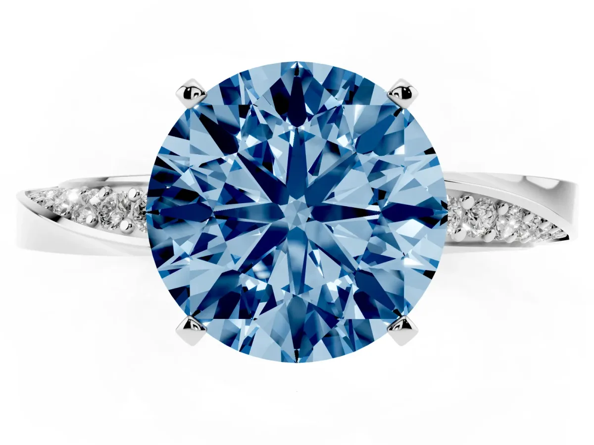 Fancy Blue Round Cut Diamond Engagement Ring with Side Stone Accents and Four-Prong Setting Silver