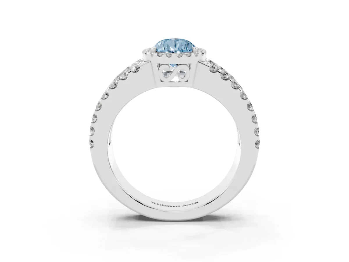 Fancy Blue Pear Cut Cut Halo Split Shank Diamond Ring with Four-Prong Setting Silver