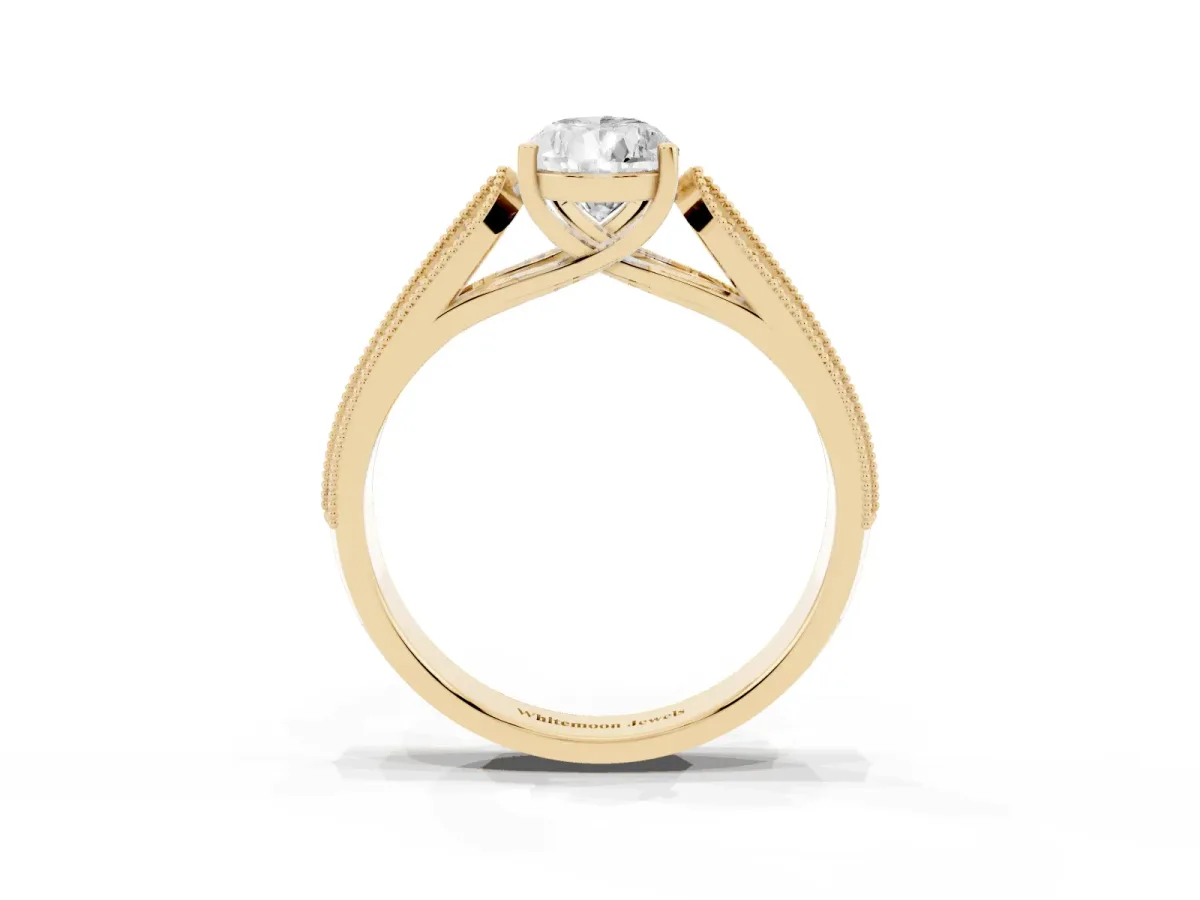 Pear Cut Cut Pave Split Shank Engagement Ring with Four-Prong Setting Yellow gold