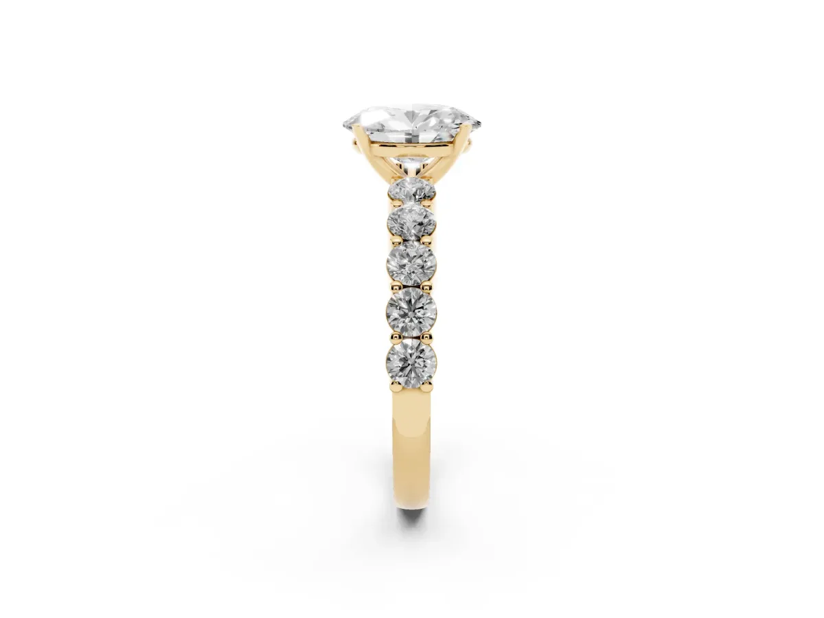 Oval Cut Diamond Solitaire Ring with Shared Prong Round Side Stones Yellow gold