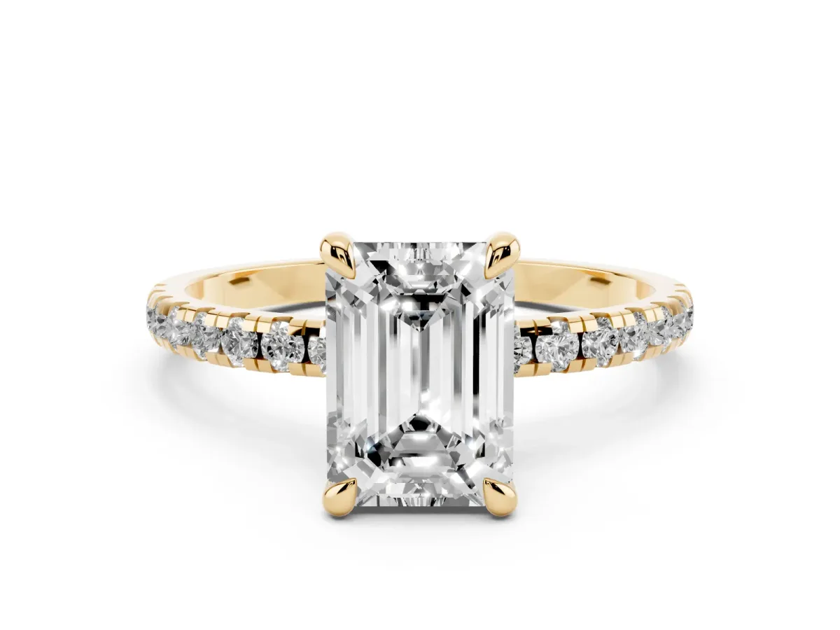 Emerald Cut Diamond Brilliant Solitaire Ring with Pavé Band and Four-Prong Setting Yellow gold