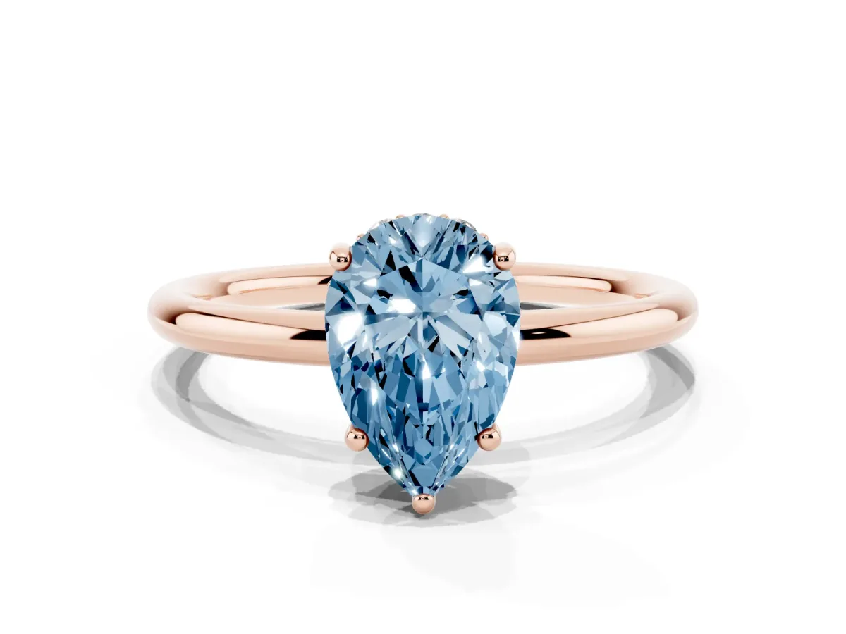 Fancy Blue Pear Cut Solitaire Diamond Ring with a Classic Band and Four-Prong Setting Rose gold