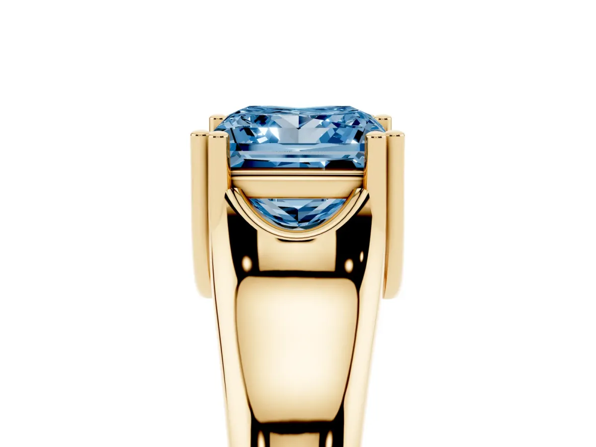 Fancy Blue Princess Cut Diamond Solitaire Ring with Wide Band and Prong Setting Yellow gold