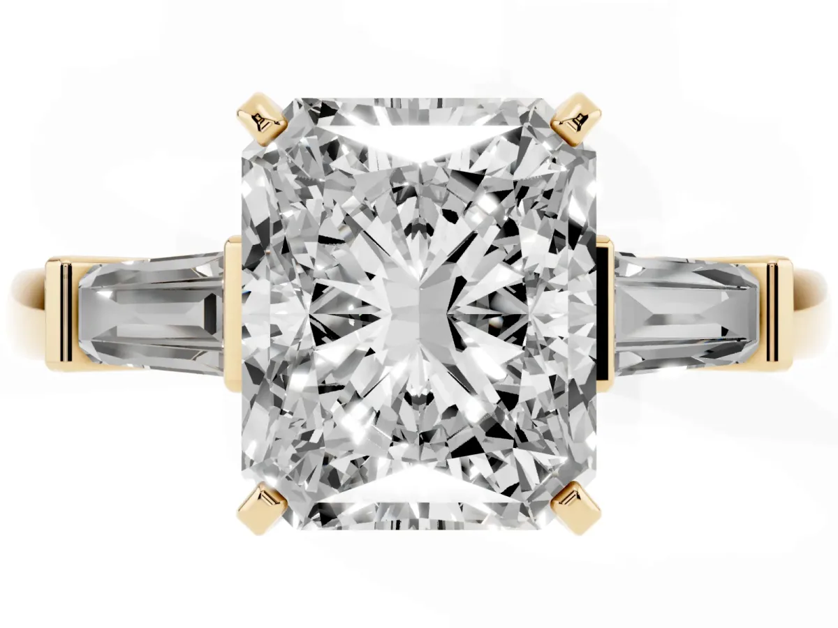 Radiant Cut Cut Diamond Solitaire Ring with Tapered Baguette Accents and Four-Prong Setting Yellow gold