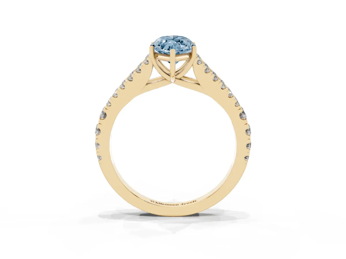 Fancy Blue Marquise Cut Diamond Split Shank Pavé Engagement Ring with Four-Prong Setting Yellow gold
