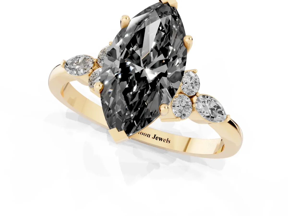 Fancy Black Marquise Cut Brilliant Diamond Solitaire Ring with Pear Side Stones and Four-Prong Setting Yellow gold