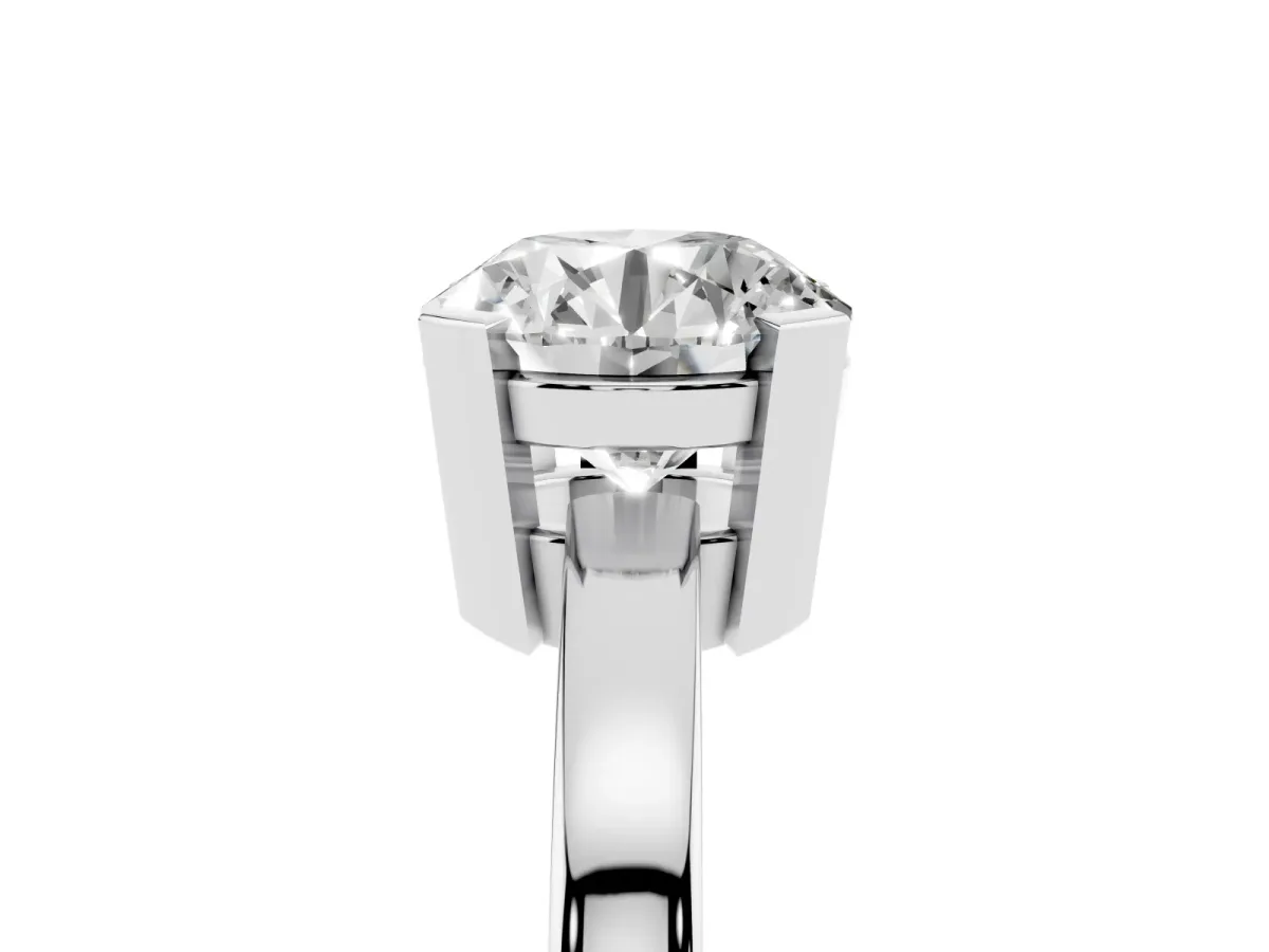 Round Cut Cut Solitaire Ring with Four-Prong Setting and Classic Band Silver