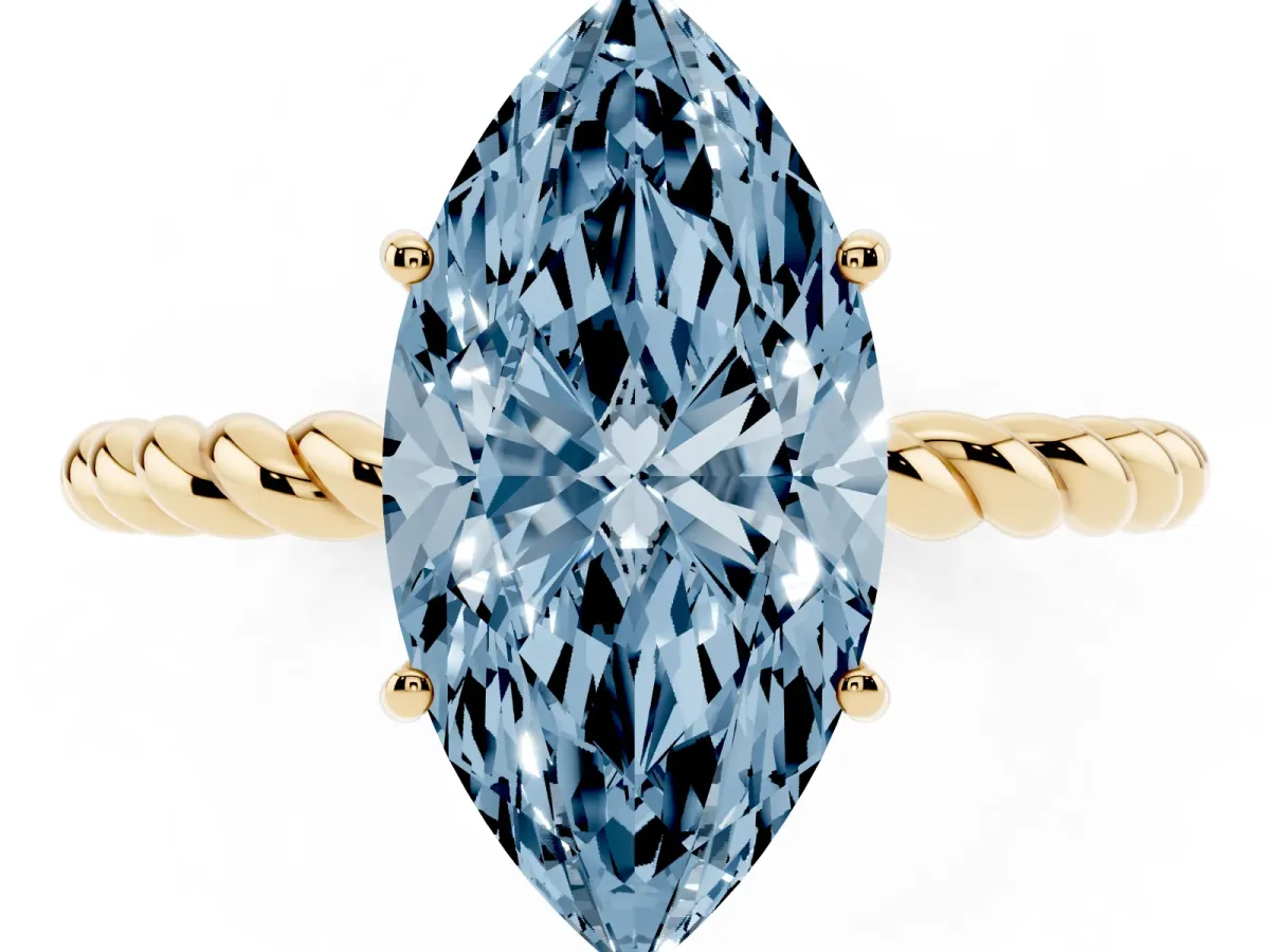 Fancy Blue Marquise Cut Solitaire Twist Band Ring with Four-Prong Setting Yellow gold