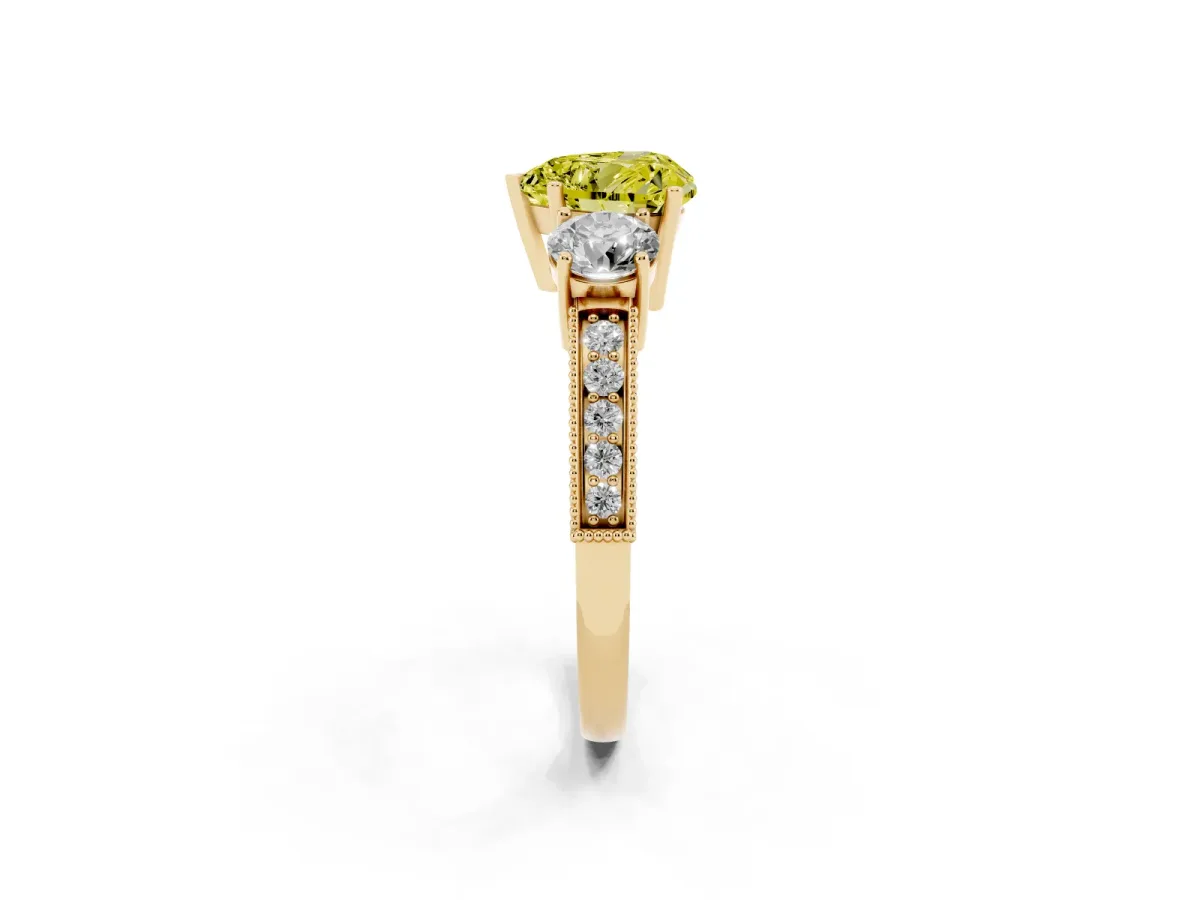 Fancy Yellow Heart Cut Three-Stone Diamond Ring with Pavé Band and Four-Prong Setting Yellow gold
