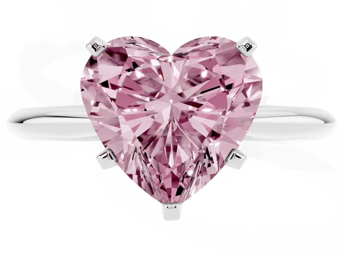 Fancy Pink Heart Cut Cut Solitaire Ring with Four-Prong Setting on a Classic Band Silver