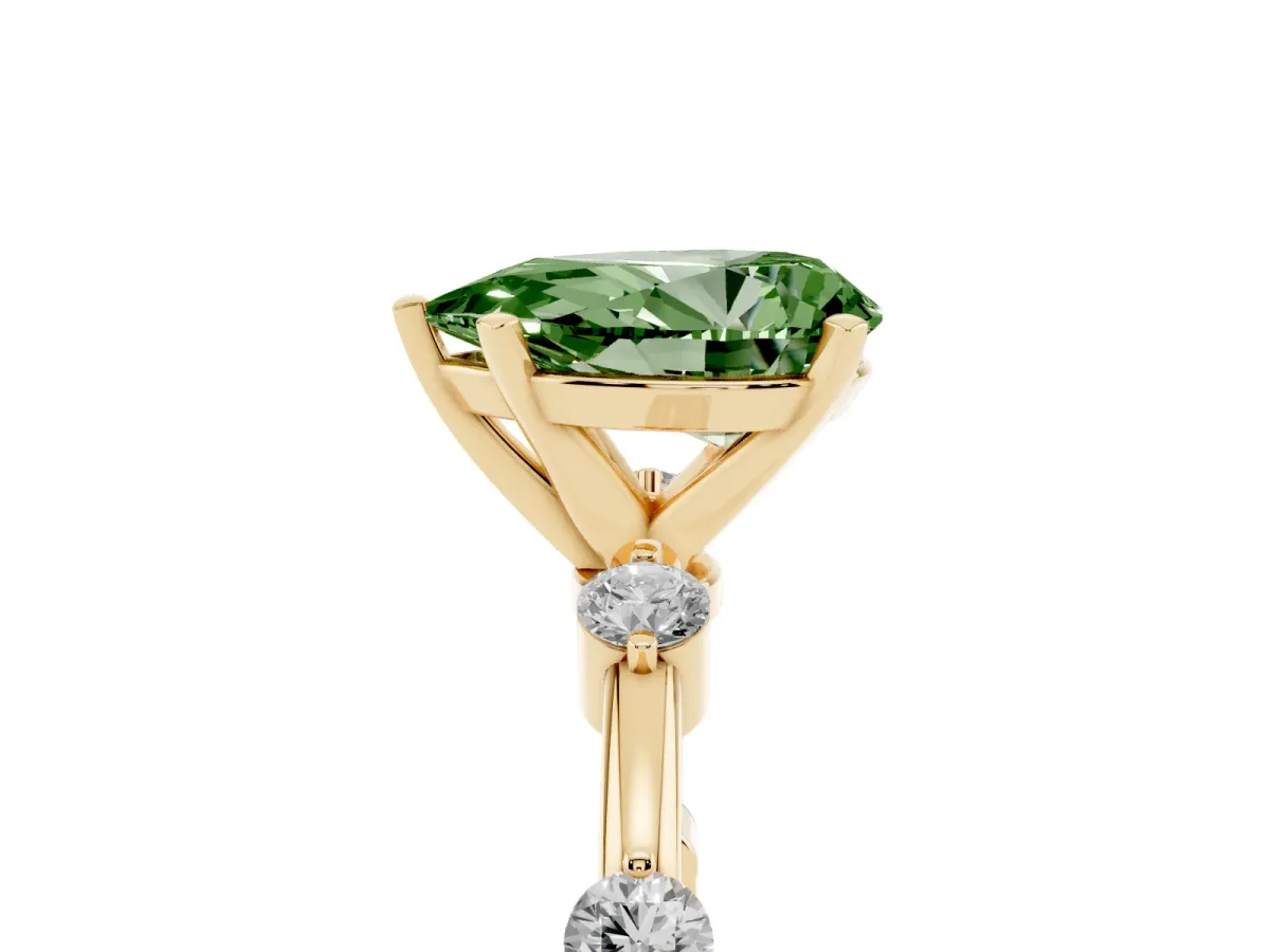 Fancy Green Pear Cut Solitaire Diamond Ring with Bezel Set Side Stones and Prong Setting Yellow gold