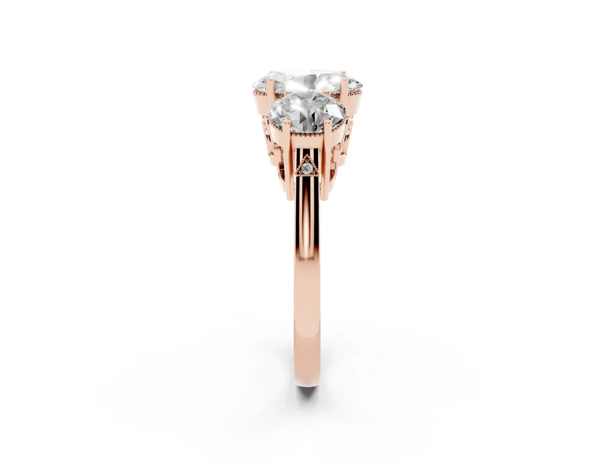 Three-Stone Oval Cut Diamond Engagement Ring with Prong Setting on a Classic Band Rose gold