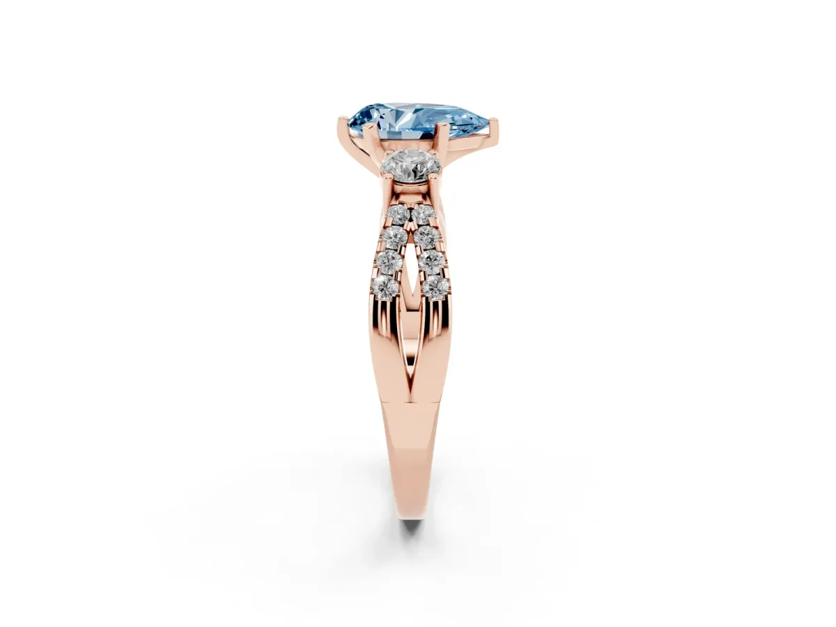 Fancy Blue Pear Cut Diamond Three-Stone Ring with Pavé Split Shank and Four-Prong Setting Rose gold