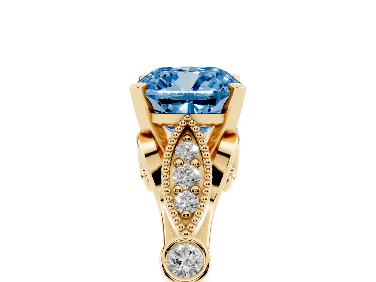 Fancy Blue Cushion Cut Cut Diamond with Milgrain Marquise and Bezel Accents on a Solitaire Band with Prong Setting Yellow gold