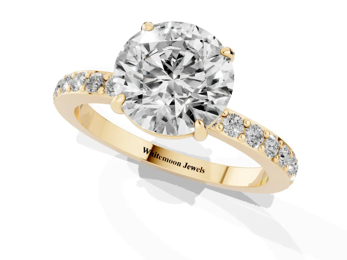 Round Cut Diamond Pavé Engagement Ring with Round Accents and Prong Setting Yellow gold
