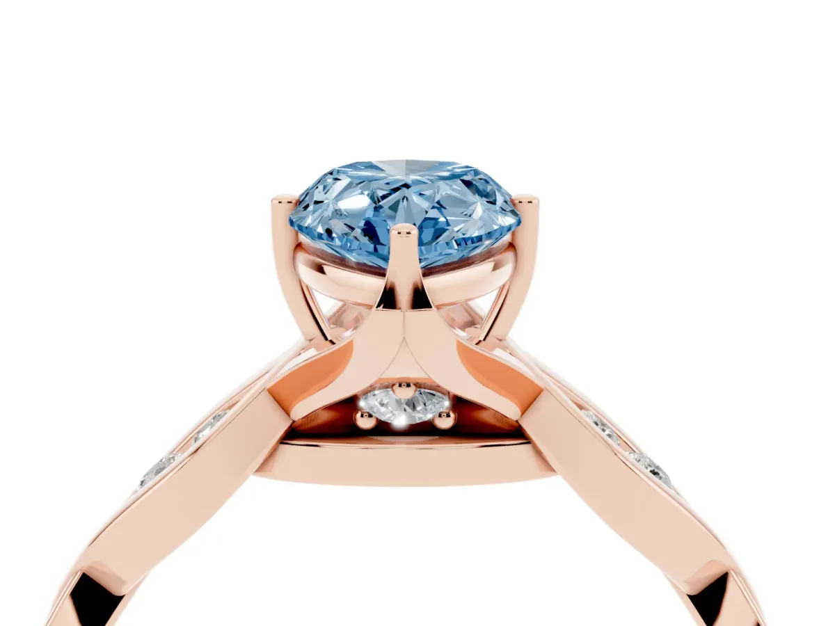 Fancy Blue Pear Cut Solitaire Twist Band with Leaf Prong Setting Rose gold