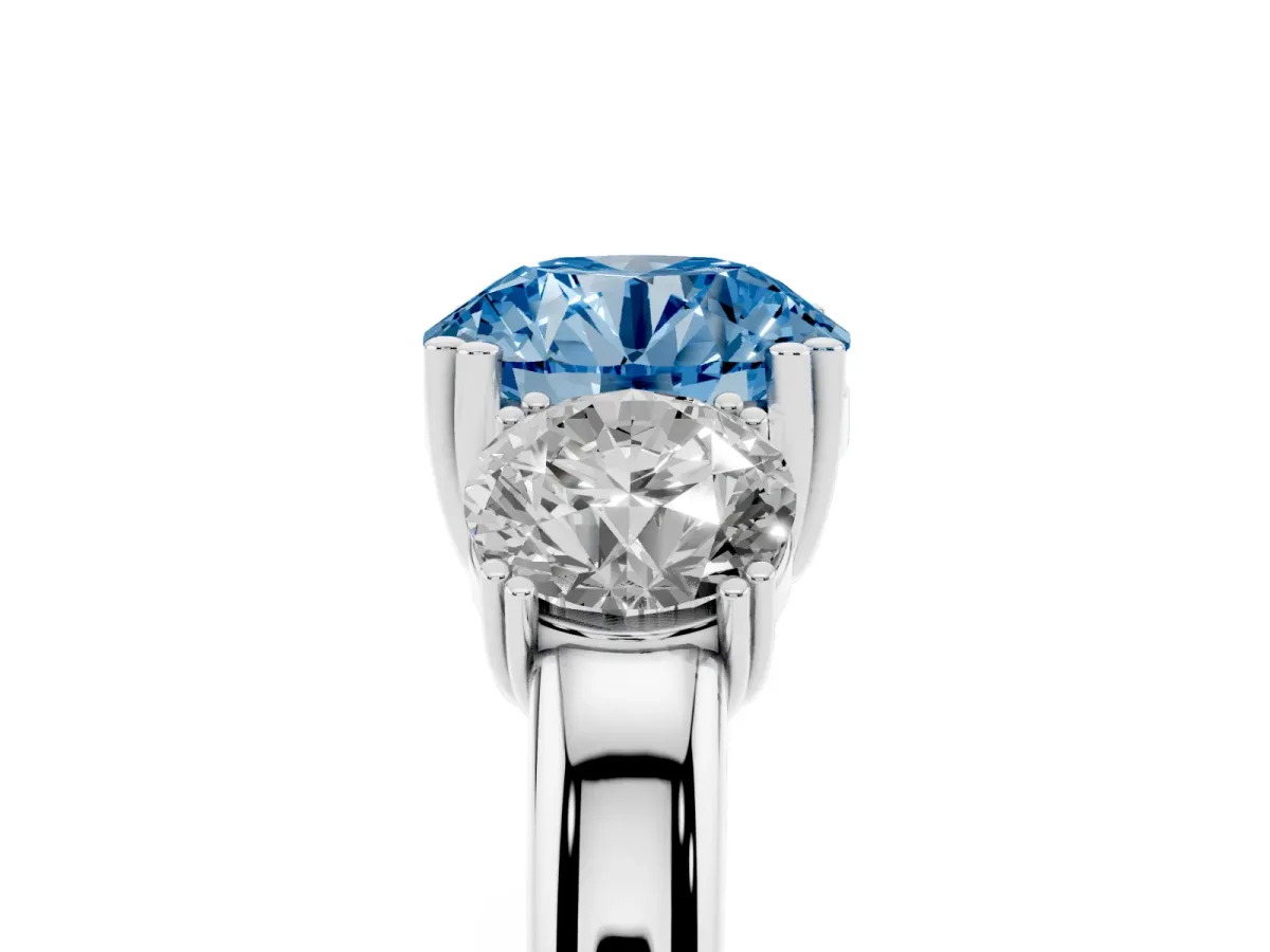 Fancy Blue Three-Stone Round Cut Cut Diamond Ring with Channel Set Band and Four-Prong Setting Silver
