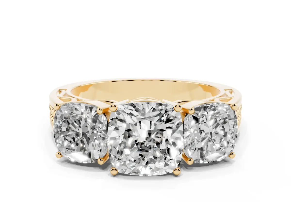 Cushion Cut Diamond Three-Stone Ring with Prong Setting and Textured Band Yellow gold